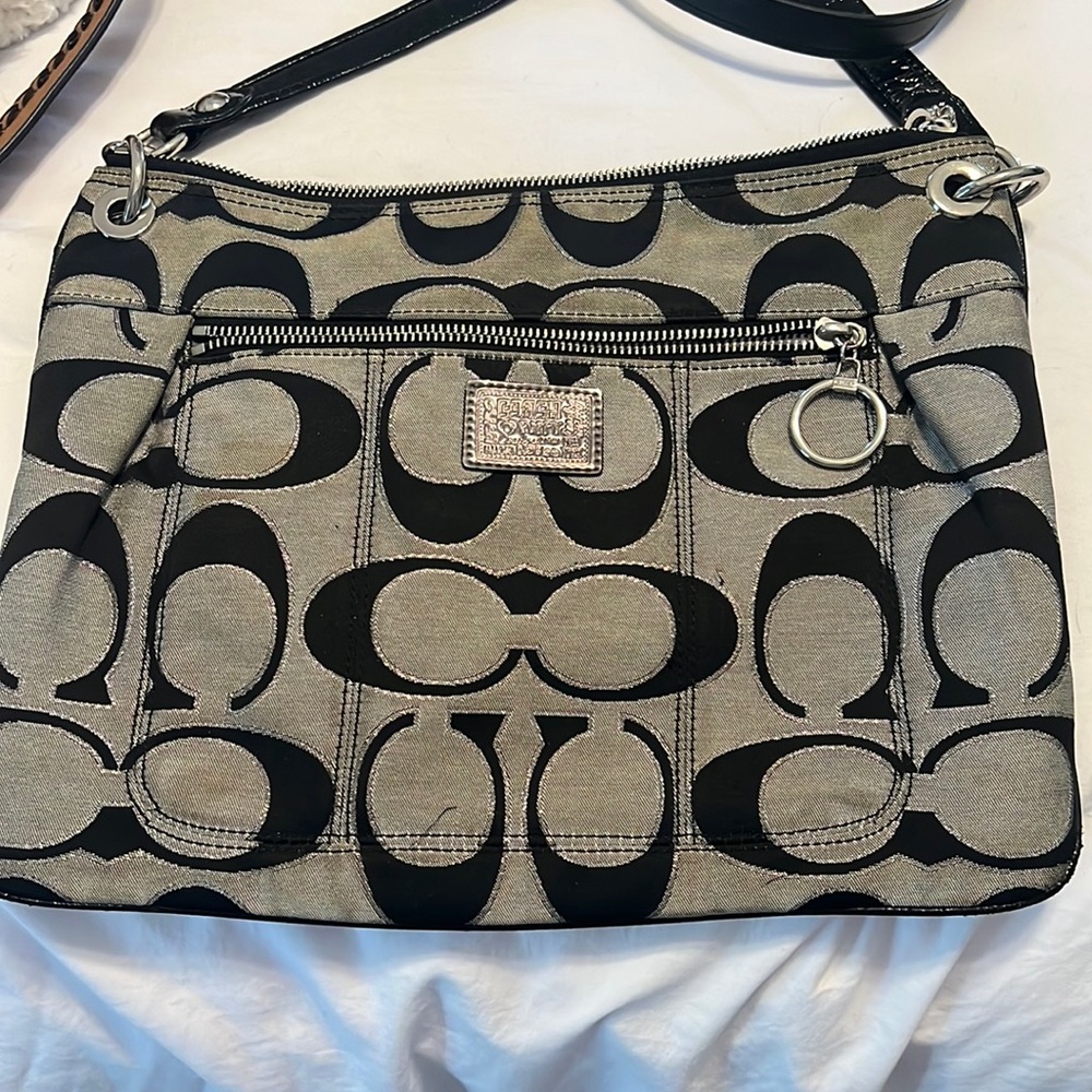 Coach Poppy black and gray with silver plated hardware.